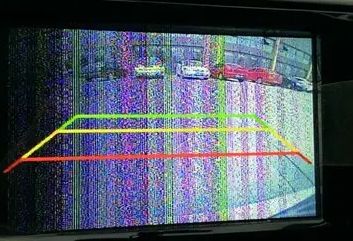 Faulty car infotainment system displaying errors or a black screen, signaling a need for car Android repair.