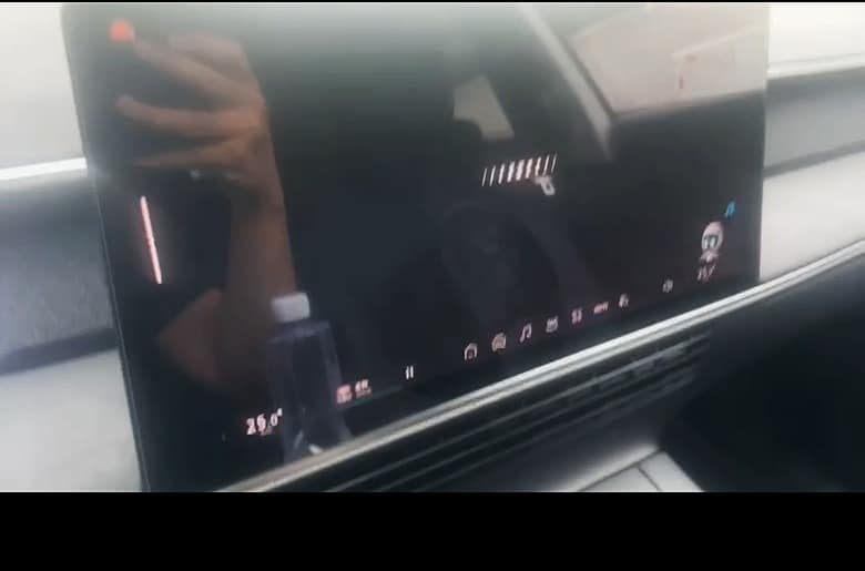 XPeng display with most of the visible interface faded or missing